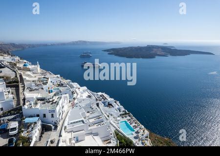 An aerial view of Santorini island surrounded by buildings Stock Photo