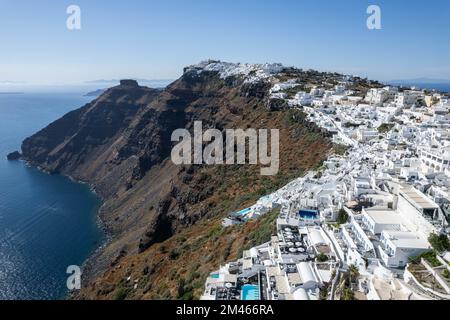 An aerial view of Santorini island surrounded by buildings Stock Photo