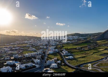 An aerial view of Santorini island surrounded by buildings Stock Photo