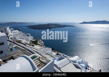 An aerial view of Santorini island surrounded by buildings Stock Photo