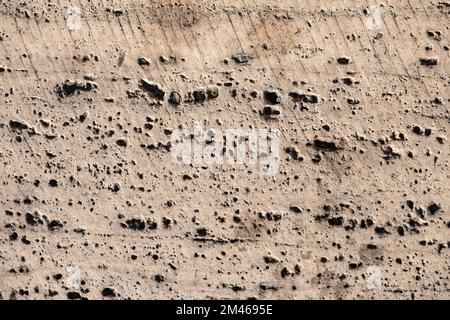 View of an abstract stone texture. Texture of weathered stone tiles. Stock Photo