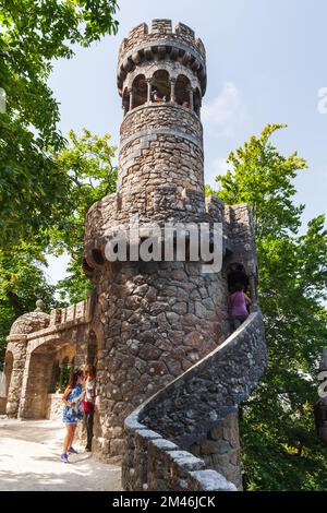 Sintra, Portugal - August 14, 2017: Tourists visit the Round tower of the Quinta da Regaleira Stock Photo