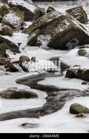 A Partially Frozen Bow Lee Beck below Summerhill Force, Bowlees, North Pennines, Teesdale, County Durham, UK Stock Photo