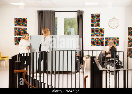 Students resting in cafeteria Stock Photo