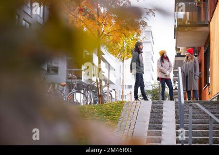 Friends talking together Stock Photo