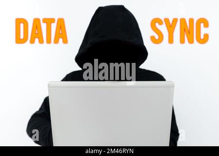 Hand writing sign Data Sync. Business approach data that is continuously generated by different sources Stock Photo