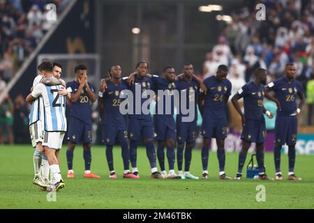 Lusail City, Qatar. 18th Dec, 2022. Paulo Dybala of Argentina is congratulated by team-mate Lionel Messi after scoring in the penalty shoot-out during the 2022 FIFA World Cup Final at Lusail Stadium in Lusail City, Qatar on December 18, 2022. Photo by Chris Brunskill/UPI Credit: UPI/Alamy Live News Stock Photo