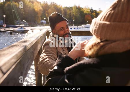 Friends talking together Stock Photo