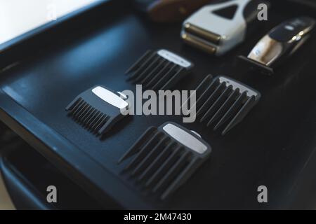 Professional shaving kit found in hairdresser salon. Black colour. Closeup portrait. . High quality photo Stock Photo
