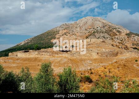 view over the ruins of the acropolis of Mycenae, in present-day Argolis, in Greece, on a summer day Stock Photo