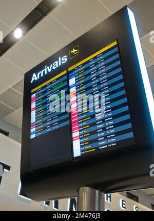 Arrivals indicator board at Manchester Airport, Terminal 2 Stock Photo