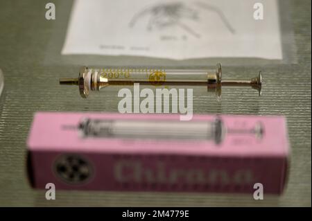 A historical reusable glass syringe from the Czechoslovak manufacturer Chirana. (Material: glass and surgical steel, made between 1935 and 1945). Stock Photo