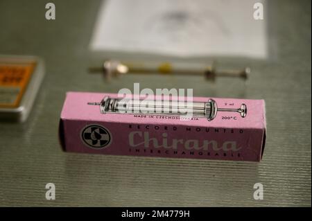 A historical reusable glass syringe from the Czechoslovak manufacturer Chirana. (Material: glass and surgical steel, made between 1935 and 1945). Stock Photo