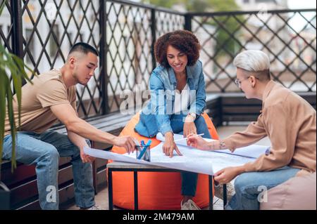 Architectural team working on a site development plan Stock Photo