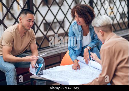 Group of architects working on a building project Stock Photo