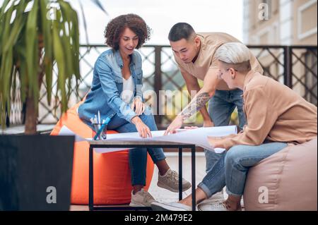 Team of design professionals working on a new construction project Stock Photo
