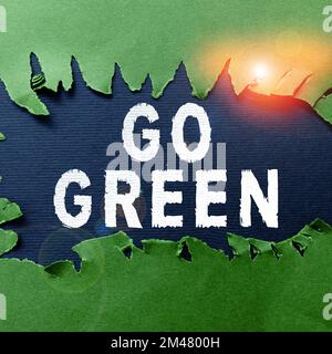 Text caption presenting Go Green. Internet Concept making more environmentally friendly decisions as reduce recycle Stock Photo