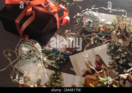 Photos of children against Christmas lights background. Stock Photo