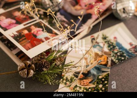 Photos of children against Christmas lights background. Stock Photo