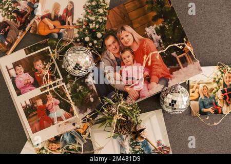 Photos of children against Christmas lights background. Stock Photo