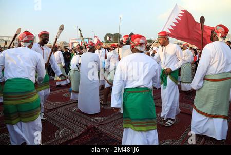 Doha, Qatar. 18th Dec, 2022. Qatari persons during the celebration of the National Day and the final match between Argentina and France in the FIFA World Cup. celebrations and activities were held in various places of the country including Katara, Corniche and the town of Umm Salal Mohammed. on December 18, 2022 in Doha, Qatar. (Credit Image: © Sidhik Keerantakath/eyepix via ZUMA Press Wire) Stock Photo