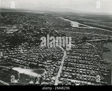 El Fanguito. Original caption: Aerial view of El Fanguito slum and Martin Pena Canal. Government of Puerto Rico. State: Puerto Rico. Place: San Juan. Stock Photo