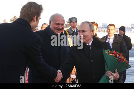 Minsk, Belarus. 19th Dec, 2022. Belarusian President Alexander Lukashenko (C) receives Russian President Vladimir Putin (R) as he arrives at the National Airport in Minsk, Belarus, Monday, Dec. 19, 2022. President Putin arrives in Minsk for talks with his Belarusian President Alexander Lukashenko for the first time in three and a half years. Photo by Kremlin Pool/UPI Credit: UPI/Alamy Live News Stock Photo