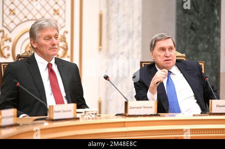 Minsk, Belarus. 19th Dec, 2022. Kremlin spokesman Dmitry Peskov (L) and Kremlin aide Yury Ushakov (R) are seen during the meeting between Belarusian President Alexander Lukashenko and Russian President Vladimir Putin at the Palace of Independence in Minsk, Belarus, Monday, Dec. 19, 2022. President Putin arrives in Minsk for talks with his Belarusian President Alexander Lukashenko for the first time in three and a half years. Photo by Kremlin Pool/UPI Credit: UPI/Alamy Live News Stock Photo