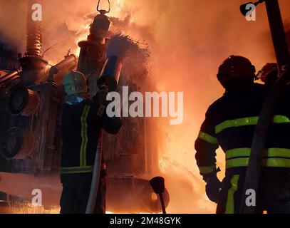 Kyiv, Ukraine. 19th Dec, 2022. Firefighters conduct extinguishing works after Russia's drones attacks in Kyiv, Ukraine on December 19, 2022. Ukrainian Armed Forces said that, Russian forces attacked the capital Kyiv this morning with 35 unmanned aerial vehicles, 30 of which were destroyed by Ukrainian forces. Photo by State Emergency Service of Ukraine/UPI. Credit: UPI/Alamy Live News Stock Photo