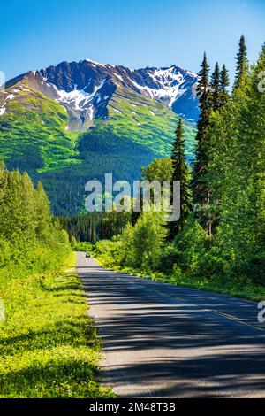 Camper driving the Stewart-Cassiar Highway; near Red Flats Rest Area; Oweegee Range; British Columbia; Canada Stock Photo
