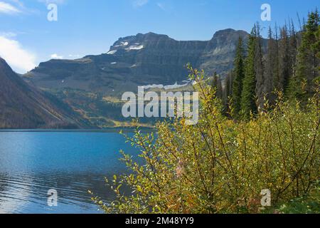 Cameron Lake, in a glacial cirque, and Mount Custer. The lake crosses the United States - Canada border in Waterton Glacier International Peace Park Stock Photo