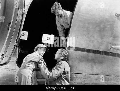 Mae Clarke, Robert Livingston, on-set of the Film, 'Daredevils Of The Clouds', Republic Pictures, 1948 Stock Photo