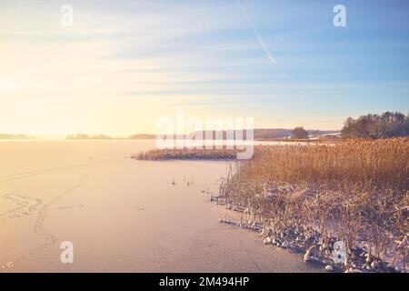 Hemmelsdorfer See in northern Germany at sunrise in winter. High quality photo Stock Photo
