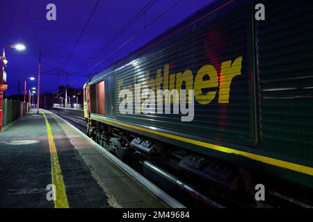 Freightliner class 66 diesel locomotive  at Oxenholme The lake District railway station in a engineers possession waiting while ballast is unloaded Stock Photo