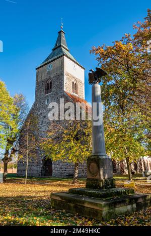 Monument to the victims of the Franco-Prussian War in front of the parish church of St. Mary in Altlandsberg, Brandenburg, Germany Stock Photo