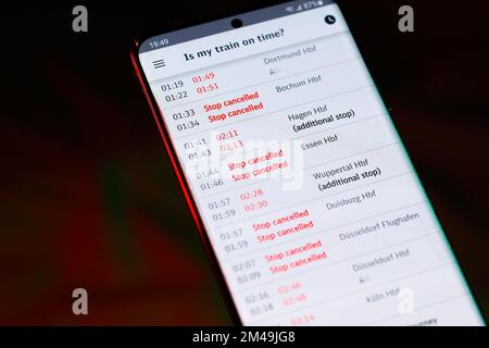 Verspätung! A train delay and rerouting notice on the Deutsche Bahn app. DB is the national rail company in Germany operating short and long distance Stock Photo
