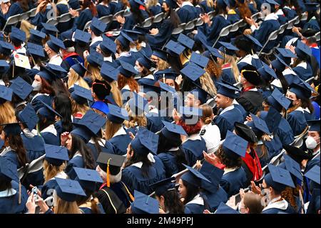 College students of George Washington University in the traditional robe and mortarboard on their graduation day, Washington DC, United States of Stock Photo