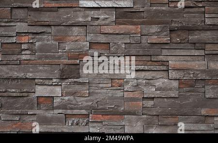 A closeup shot of a brick wall in a random pattern Stock Photo