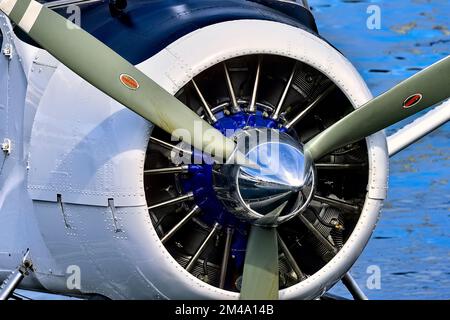 A propeller driven engine on a float plane aircraft tied to a warf on Salt Springs Island British Columbia Canada. Stock Photo