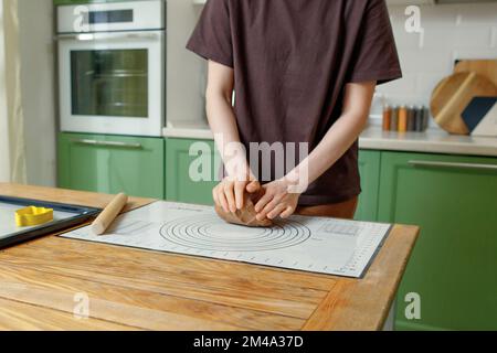 Dessert cooking process using a silicone baking mat with markings Stock Photo