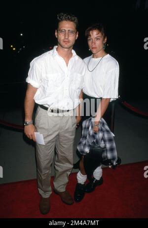 Jason Priestley and Christine Elise at the Premiere of 'Manhattan Murder Mystery', Samuel Goldwyn Theater, Beverly Hills August 16, 1993  Credit: Ralph Dominguez/MediaPunch Stock Photo