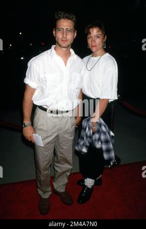 Jason Priestley and Christine Elise at the Premiere of 'Manhattan Murder Mystery', Samuel Goldwyn Theater, Beverly Hills August 16, 1993  Credit: Ralph Dominguez/MediaPunch Stock Photo