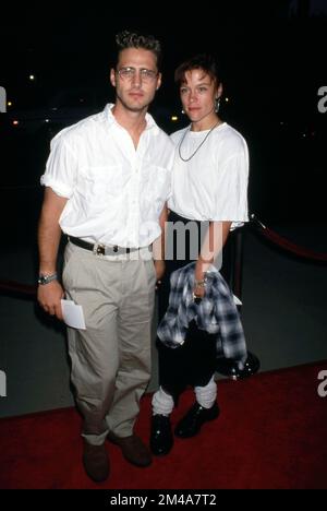 Jason Priestley and Christine Elise at the Premiere of 'Manhattan Murder Mystery', Samuel Goldwyn Theater, Beverly Hills August 16, 1993  Credit: Ralph Dominguez/MediaPunch Stock Photo