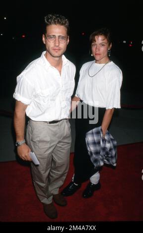 Jason Priestley and Christine Elise at the Premiere of 'Manhattan Murder Mystery', Samuel Goldwyn Theater, Beverly Hills August 16, 1993  Credit: Ralph Dominguez/MediaPunch Stock Photo