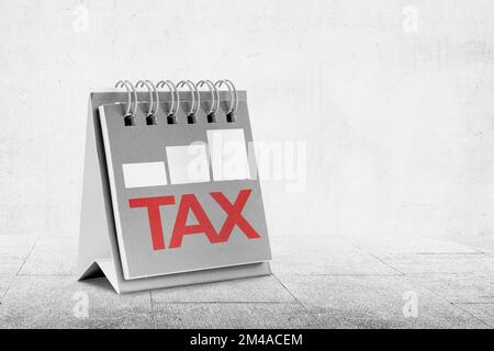 Calendar with graph and tax text on white background Stock Photo