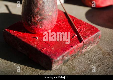 The colour red for the make up of the Kathakali-dancers is made from Chayallium Stock Photo