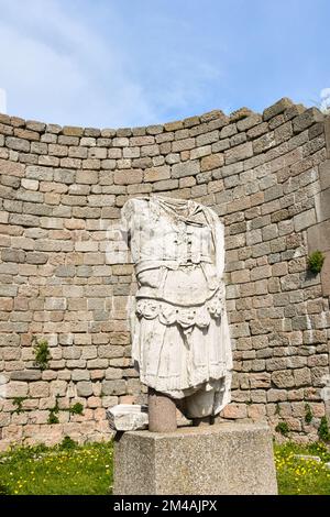 Headless armored statue of Trajan in the temple of Trajan, in the ancient city of Pergamum (Pergamon). Bergama, Izmir, Turkey. Acropolis. Stock Photo