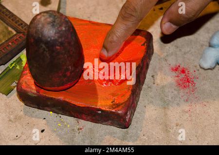 The colour red for the make up of the Kathakali-dancers is made from Chayallium Stock Photo