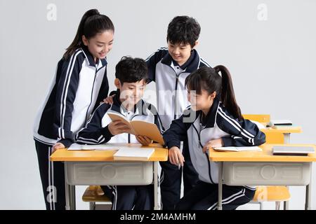 Chinese students learning in classroom Stock Photo