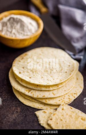 Mexican Corn Tortillas on the kitchen table. Stock Photo